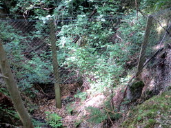 Jul 2014: 17H fence hanging over washout